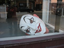 White Monkey Head in Window